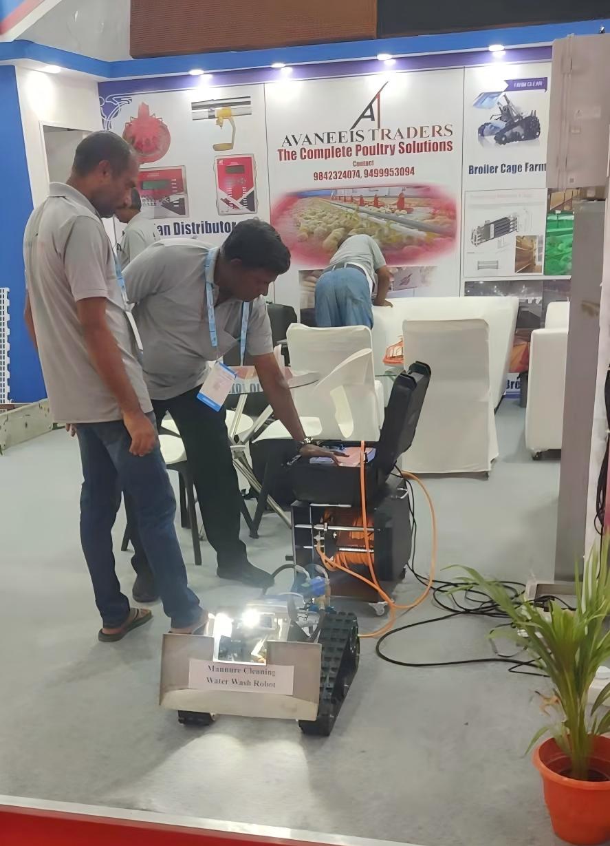 X6-Livestock-Manure-Channels-Cleaning-Robot-Product-Shot The X6 Livestock Manure Channels Cleaning Robot by RJ-BOT, featuring a tracked chassis and scraping blade for automated farm cleaning.